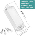 Child proof wall switch cover installed on a white wall