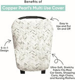 Mother using Copper Pearl Noah cover for breastfeeding privacy