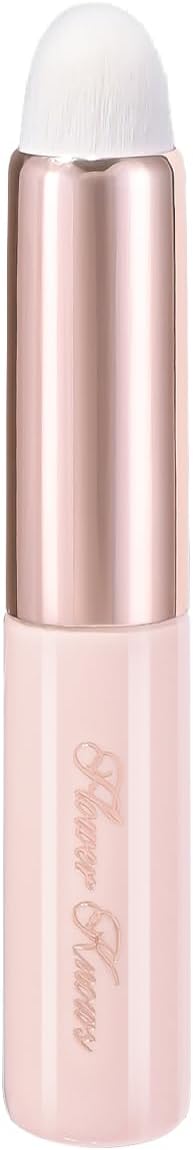 Flower Knows Lip Brush Creamy Pink front view showing the pastel pink barrel and synthetic bristles.