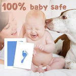 Newborn baby foot pressing against the safe mess free infant printing pad.