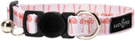 Heavy duty pink patterned cat collar displaying the sturdy metal tag ready D ring