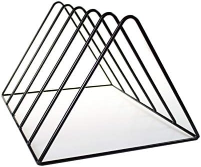 Side profile of the contemporary triangular design vinyl record holder next to a turntable.