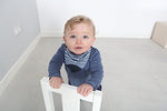 Close up view of the food grade silicone textured triangle on the Cheeky Chompers baby dribble bib.