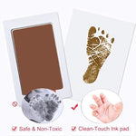 Demonstration image showing a newborn infant foot pressing gently against the mess free stamp pad.