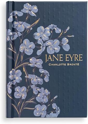 Side view of Jane Eyre hardcover showing metallic gilded page edges.
