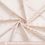 Close-up view of the light pink tufted chevron striped pattern on the textured fabric bathroom curtain.
