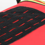 Side profile of firefighter gear bag showing ventilation vents