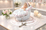 Close up of Precious Moments baby girl baptism keepsake box
