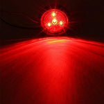 Amber front clearance light showing shock absorbing mounting ring