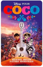 Yoto Coco kids audio card being inserted into a smart speaker slot