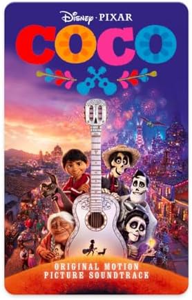 Yoto Coco kids audio card being inserted into a smart speaker slot