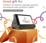 Flippy e reader cushion holder resting comfortably on a lap for hands free reading