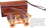 Sifaat World compact brass opera glasses resting next to the waterproof satin pouch