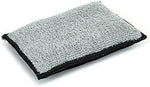 Autofiber Scrub Ninja detailing sponge being used to deep clean textured leather and vinyl automotive surfaces safely.