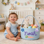 Poschnor large bunny gift basket being held by a toddler during a backyard spring egg hunt activity