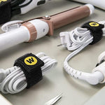 Side view highlighting the heavy duty nylon fabric stretch capability of the Selfie Strap product.