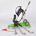 Top view of golf pen set with miniature putting green base