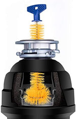 11-inch garbage disposal brush being inserted into a kitchen sink drain