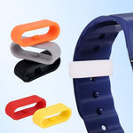 Multi color pack of twelve piece silicone fastener rings laid out on a clean backdrop