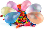 A deep blue container filled with water cushioning inflated vibrant multi color balloons