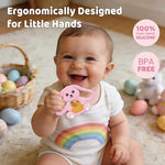 Ergonomic infant teether showing easy grip handles designed for tiny baby hands