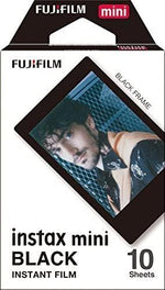 Fujifilm Instax Mini credit card size film sheets displaying developed black and white images with sleek black borders