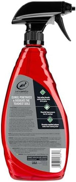 Turtle Wax wheel and tire cleaner bottle in a professional detailing setup
