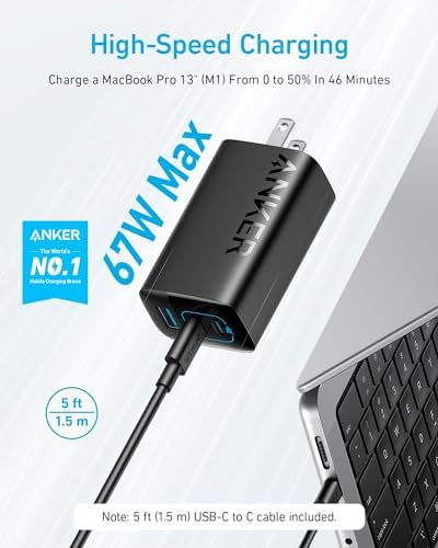 Anker compact Gallium Nitride power brick being plugged into a wall slot