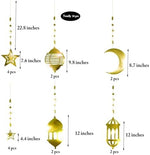 Close-up detail of the double-sided shining gold mirror finish on the crescent moon and lantern cutouts.