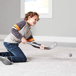 Left-handed and right-handed Franklin Sports mini hockey sticks laid out with the two foam balls.