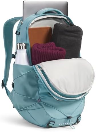 The North Face 27-liter commuter pack interior view showing the 16-inch padded laptop sleeve compartment.