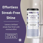 Therapy plant-based stainless steel wipes removing fingerprints from a premium refrigerator door