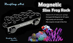 Reefing Art premium acrylic coral propagation rack mounted on an aquarium glass wall.