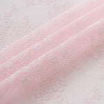 Semi sheer TUDECO pink coquette shower curtain demonstrating privacy light filtering capabilities