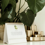 Side angle view of the durable twin-wire binding on the Mulberry Lane Co. faith-filled calendar.