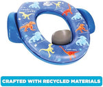 Durable plastic toddler potty seat with dinosaur graphics showing patented easy grip side handles