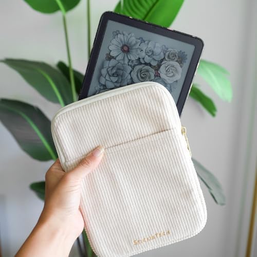 Flat lay of StickieTech cream corduroy travel sleeve
