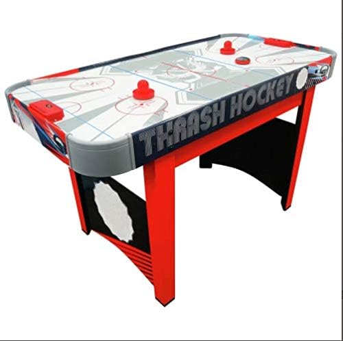 Full HYCT tabletop hockey kit arranged neatly on a smooth wooden counter demonstrating its compact and portable design.