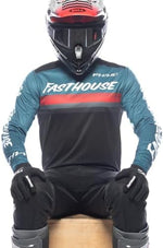 Fasthouse Carbon Force riding shirt displaying the premium black torso fabric and athletic round ribbed collar