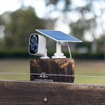 Lumiere Equine Eye stable and paddock camera mounted on a wooden fence post