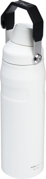 Chalk white Stanley IceFlow water bottle being carried by its integrated handle.