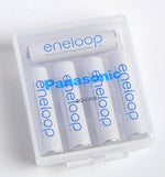 Clear grey Panasonic Eneloop storage case holding four Double A rechargeable cells.
