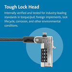 Close-up view of the keyless combination lock mechanism attached to a laptop wedge security slot.