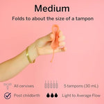 Side view of Pixie Menstrual Disc illustrating the unique oblong shape.