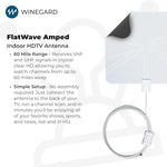 Winegard FlatWave digital TV antenna mounted on a window for optimal signal reception