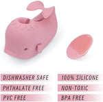 Pink whale water spout guard with the included white cleaning brush