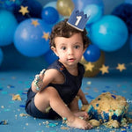 Baby wearing Agvgaza first birthday hat prop
