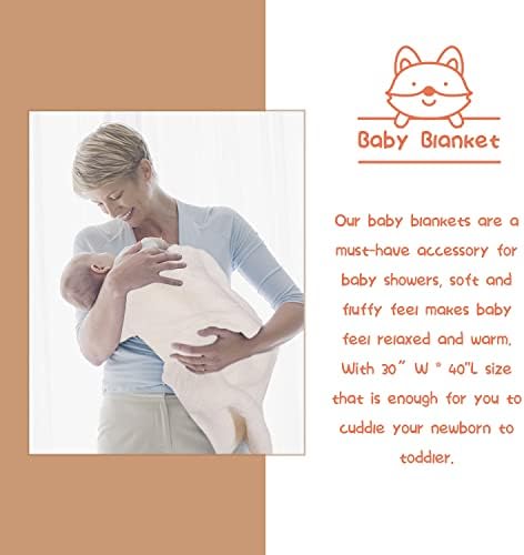Close up view of Loiieru baby soft blanket and wooden rattle