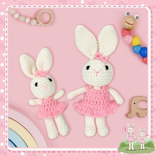Handcrafted cotton amigurumi bunny rabbit toy set with matching pink tutus for older sibling milestone gifts.