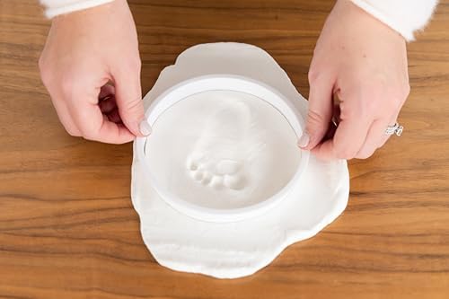 Premium white clay baby ornament kit safely packaged for gifting to expecting parents.